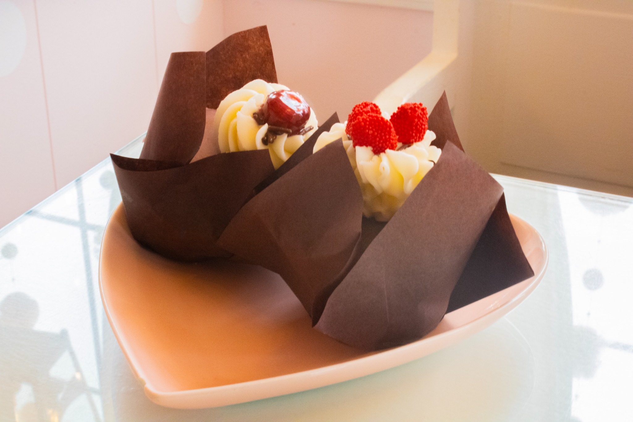 Cupcakes — café window light.
